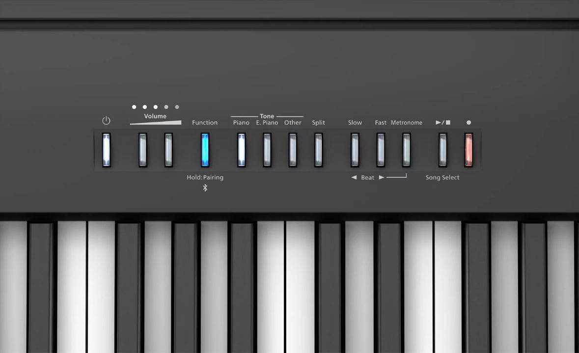 zoom sur les touches d'un piano numérique et sur les bontons de réglage